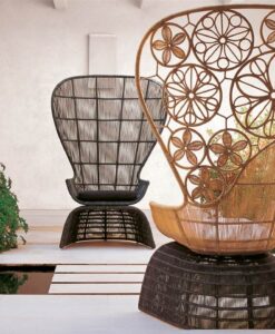 Polyester Powder Painted Aluminium Club Chair — Two large wicker peacock chairs on a patio, with ornate patterns.