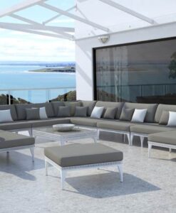 Luxury Sectional/Modular Sofa — Modern outdoor patio furniture overlooking a sea view under a white pergola.