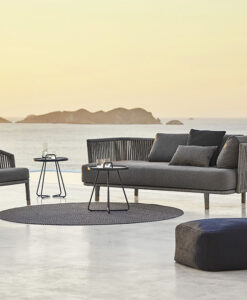2 & 3 Seater Sofa — Outdoor furniture on a patio with sea view at sunset.