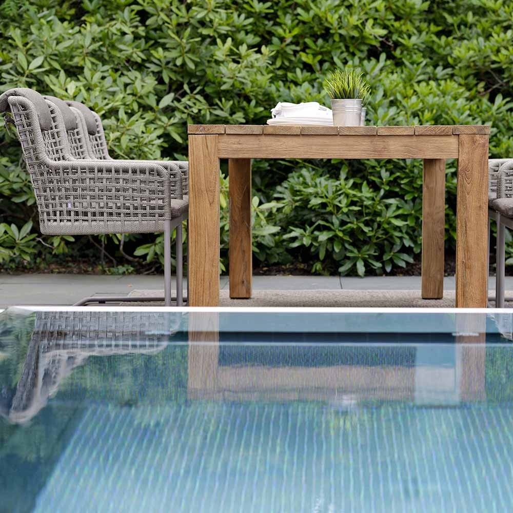 agreta dining cantilever champagne chair contemporary outdoor furniture residential Hamptons Greenwich