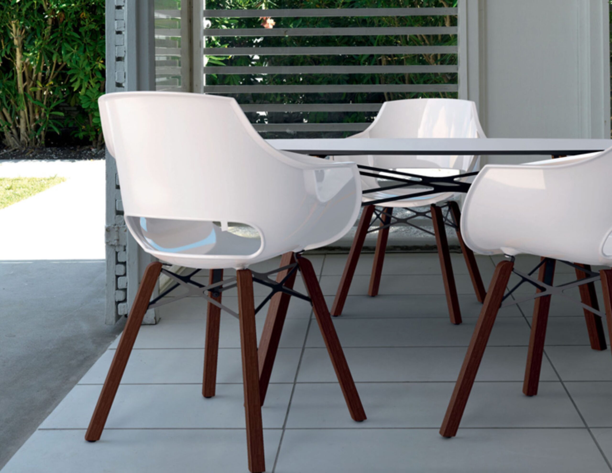 Austin injection mould polycarbonate clear ghose chair teak iroko oak wood dowel leg like vitra eames daw herman miller