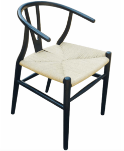 Dottie Dining Chair — A black wooden chair with curved armrests & a woven beige seat